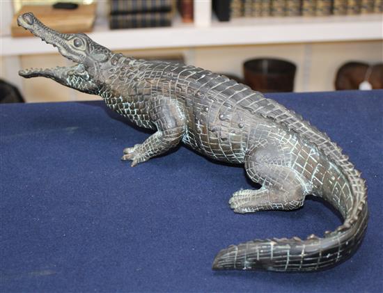 A large 20th century bronze model of a crocodile, 15.5in.